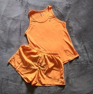 Asics orange running shorts